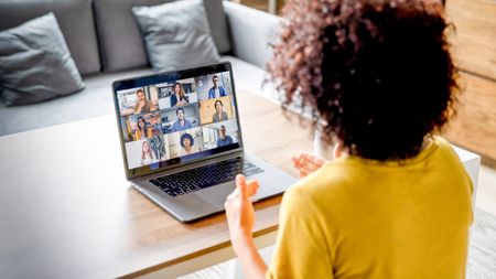 Woman using her laptop webcam for video conferencing